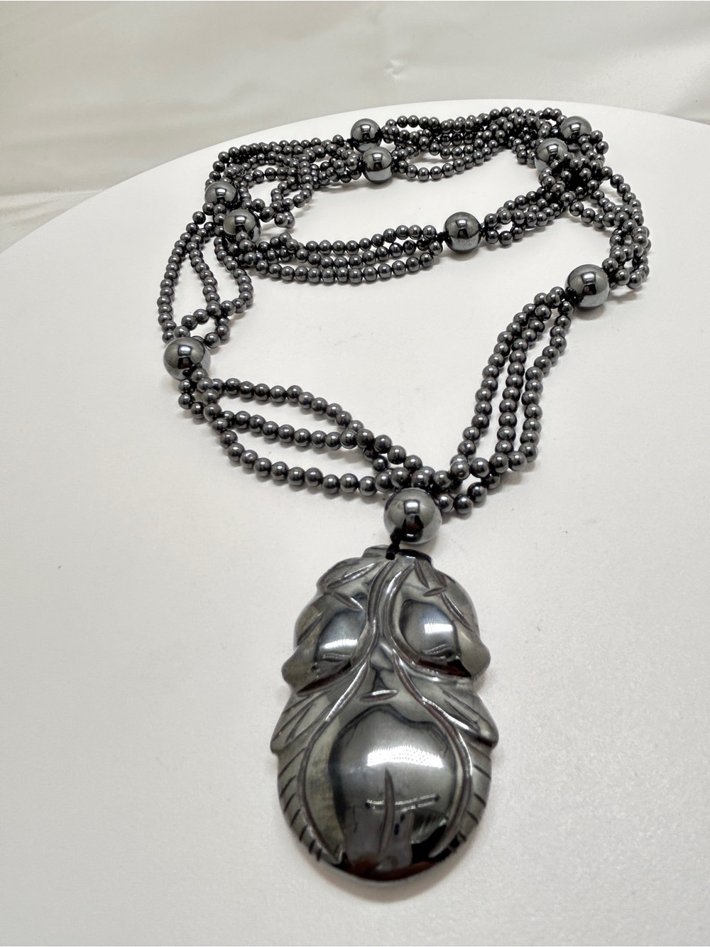 Black Hematite Pear Pendant On Long Beaded Necklace